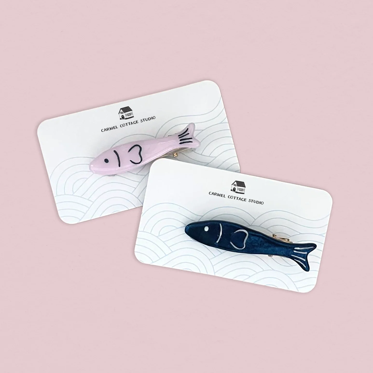 Fish hairclips on branded backing cards
